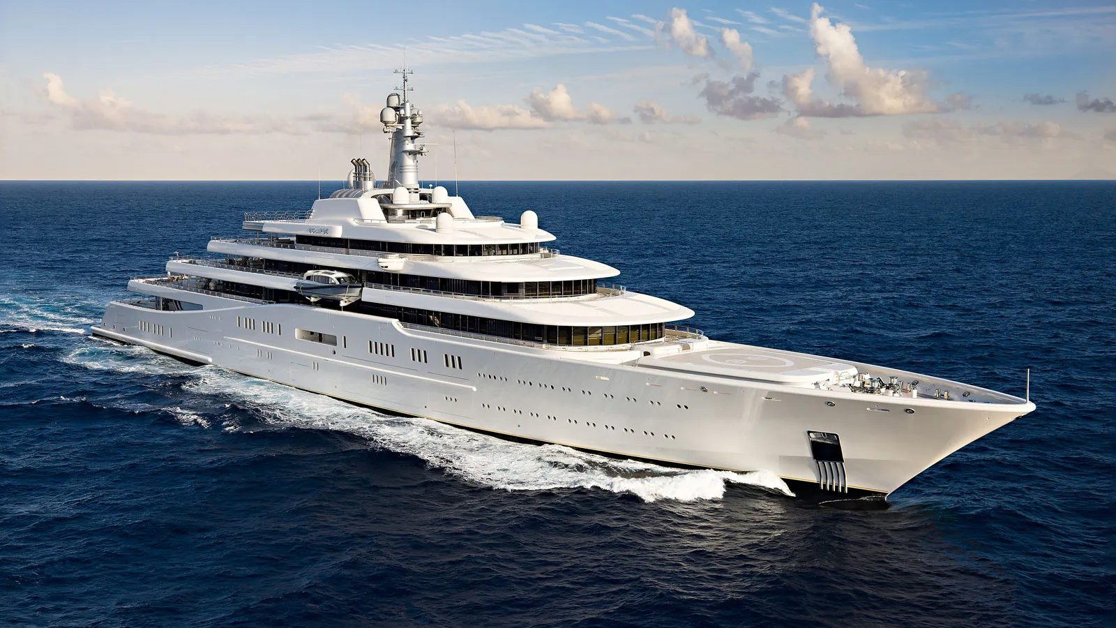 White superyacht cruising on the open sea